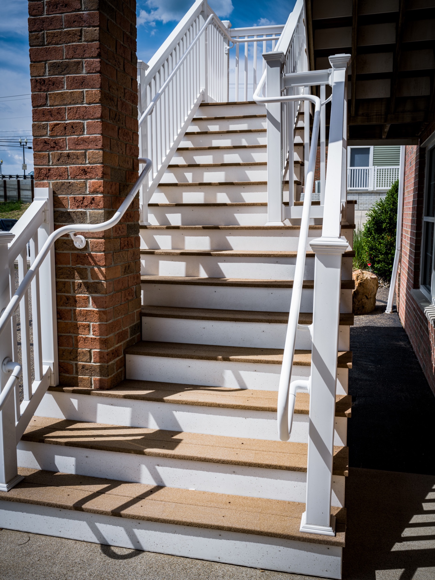 Clean, restored concrete and composite stairs after pressure washing