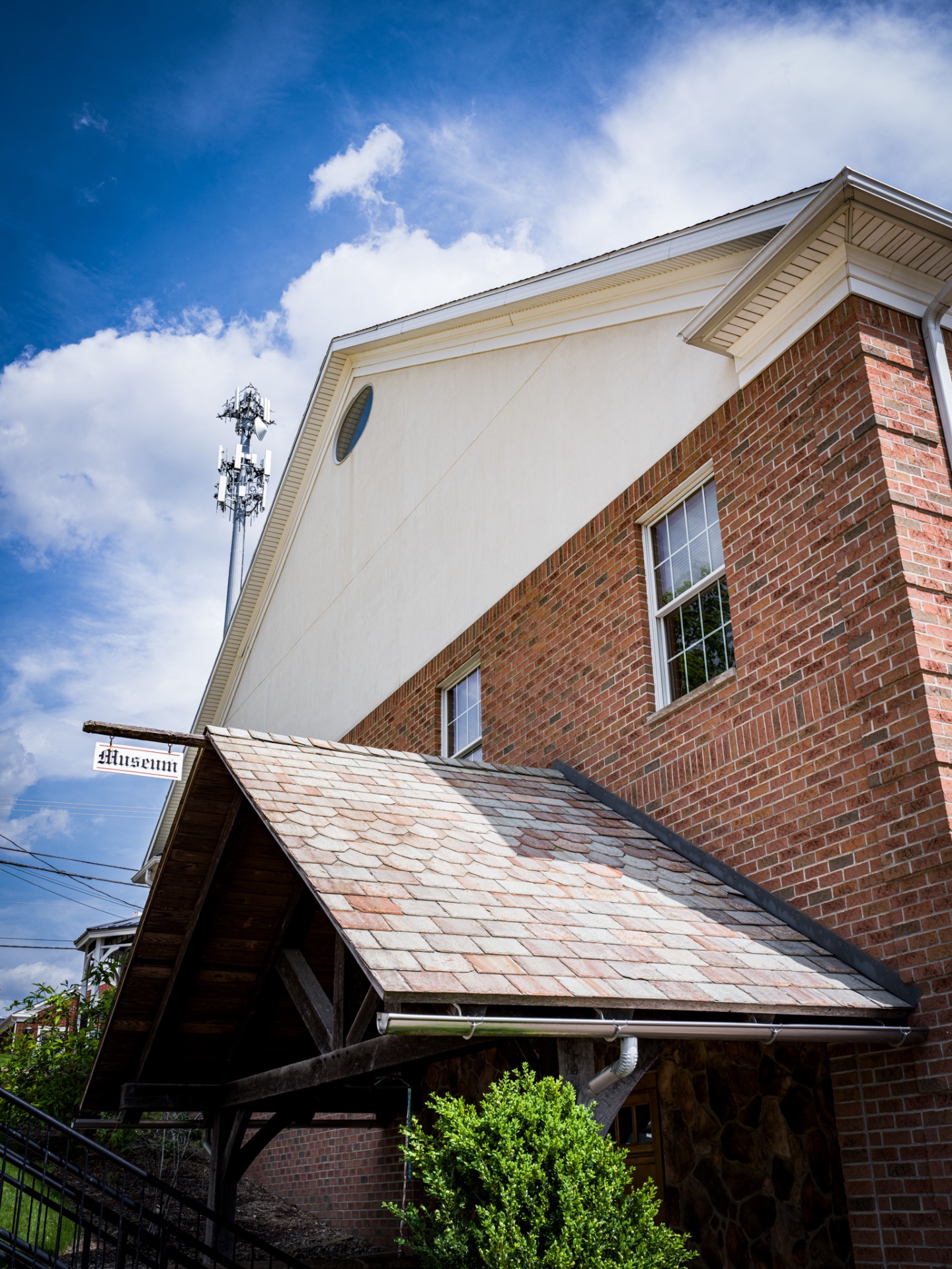 Clean brick and stucco building exterior after professional soft washing